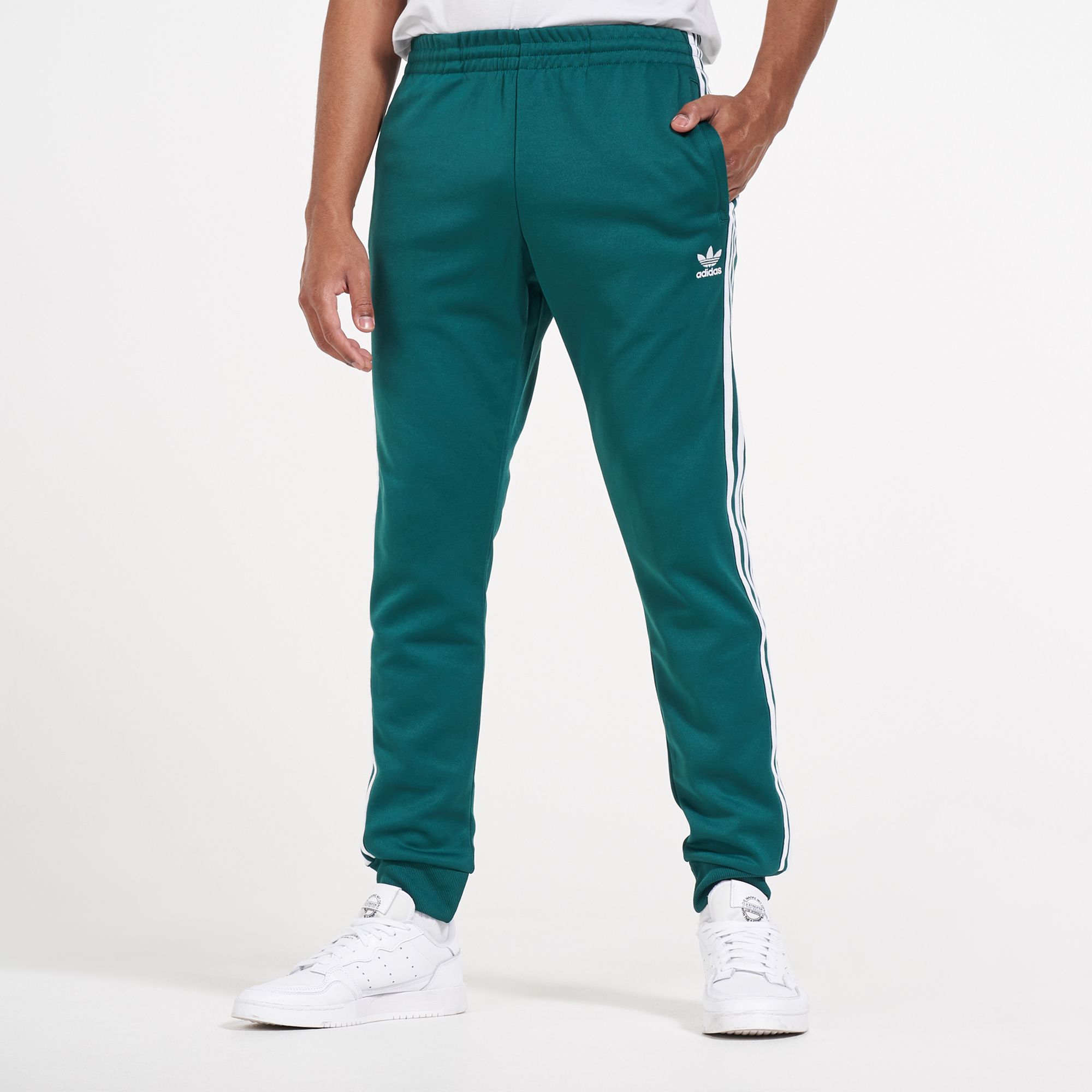 adidas sst track pants mens green