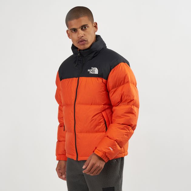 orange north face puffer jacket