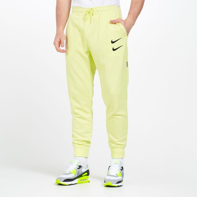 yellow nike track pants