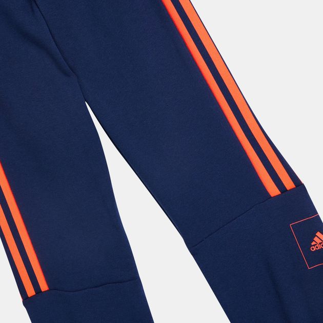 orange and blue adidas tracksuit